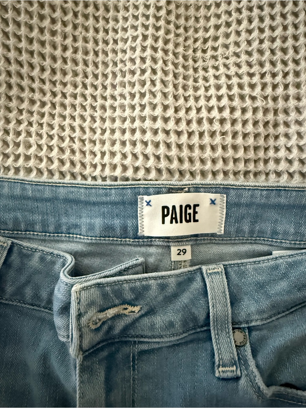 PAIGE Light Wash High Rise Jeans in Pale Blue